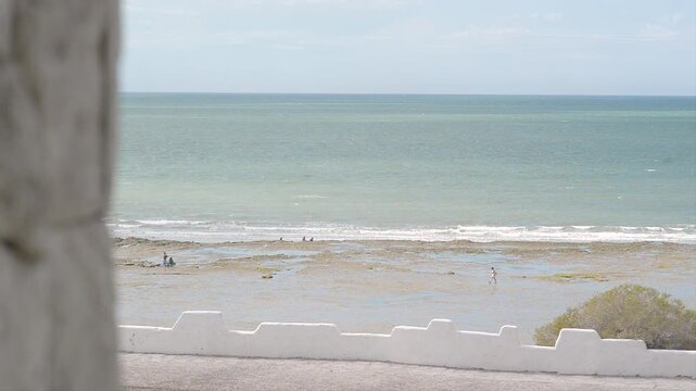 people on the beach, waves, Las Grutas, day