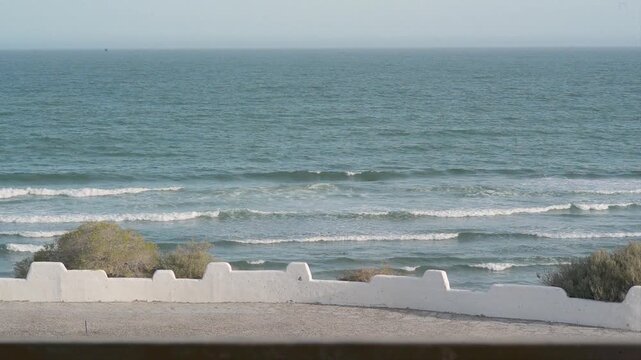 people on the beach, waves, Las Grutas, day