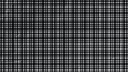 Fototapeta premium Dark textured material with wrinkles and folds on a flat surface