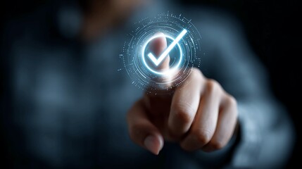 Fototapeta premium Professional interacting with futuristic digital interface displaying glowing checkmark for successful approval, verification, or completion in modern technology concept
