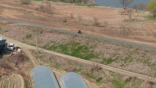 Cinematic motorcycle riding on Riverside Mountain Road with Real engine sound_Telephoto