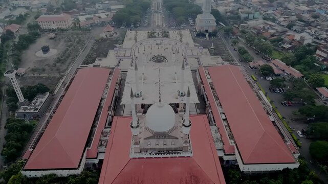 aerial view of the largest grand mosque in Central Java in the morning while people celebrate ied al fit