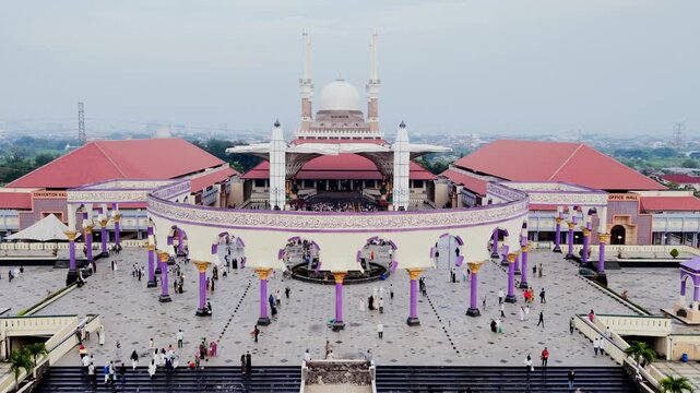 aerial view of the largest grand mosque in Central Java in the morning while people celebrate ied al fit