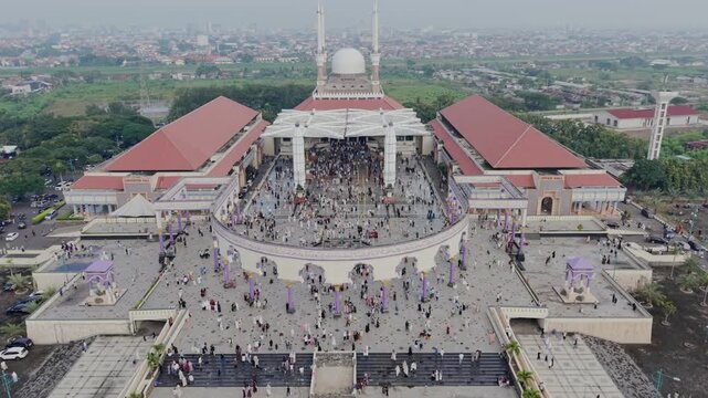 aerial view of the largest grand mosque in Central Java in the morning while people celebrate ied al fit