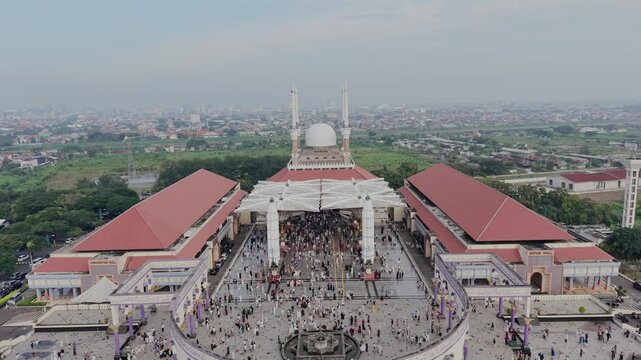 aerial view of the largest grand mosque in Central Java in the morning while people celebrate ied al fit