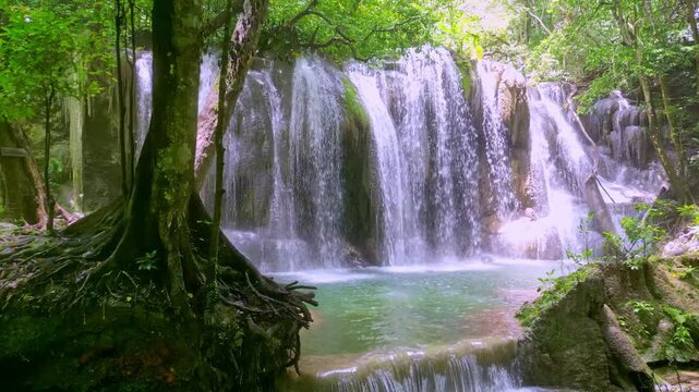 Peaceful Woodland Waterfall Landscape. Quiet Woodland Cascade With Green Pool And Tranquil Trail