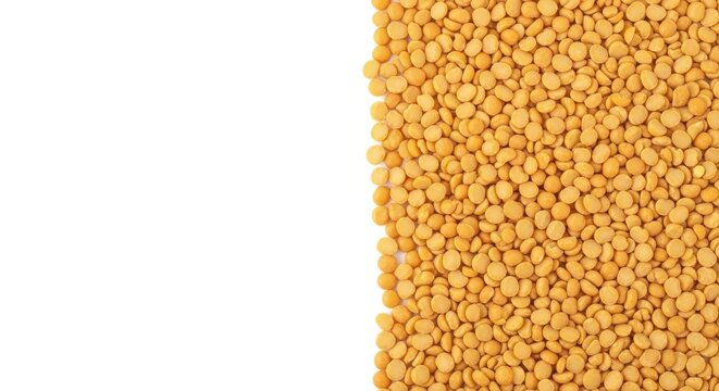 Yellow split peas isolated on white background