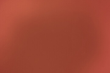Fototapeta premium Single pixel dot floats against deep red background