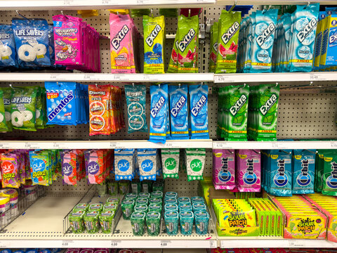 Various Chewing Gum Display On Store Shelf