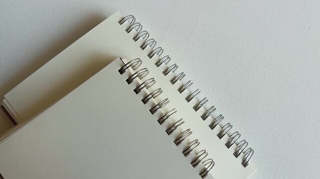 Blank Spiral Notebooks with Diagonal Camera Movement
