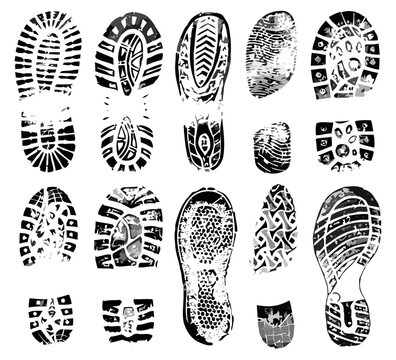 Set of diverse shoe sole prints, black ink imprints on white background