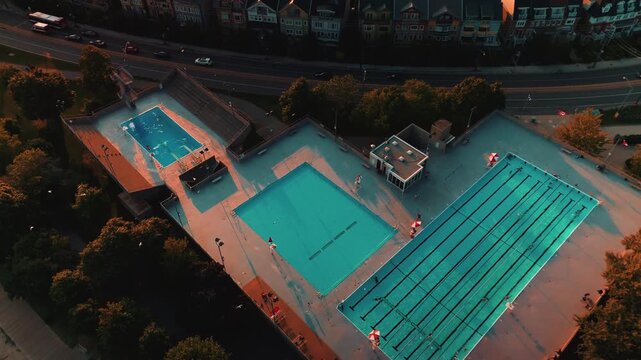 Toronto Public Outdoor Pool Complex Golden Hour Summer Aerial Drone 4K