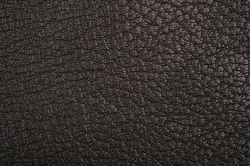 Fototapeta premium Dark leather fabric texture close up