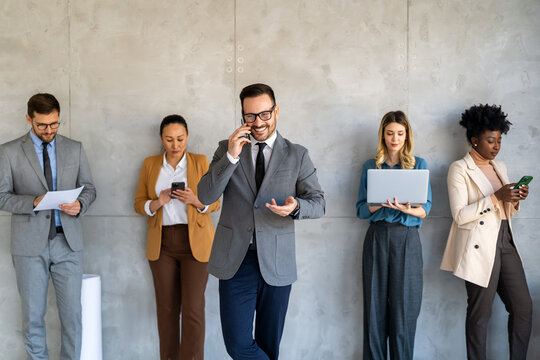Multicultural business professionals in office, teamwork to achieve corporate success together