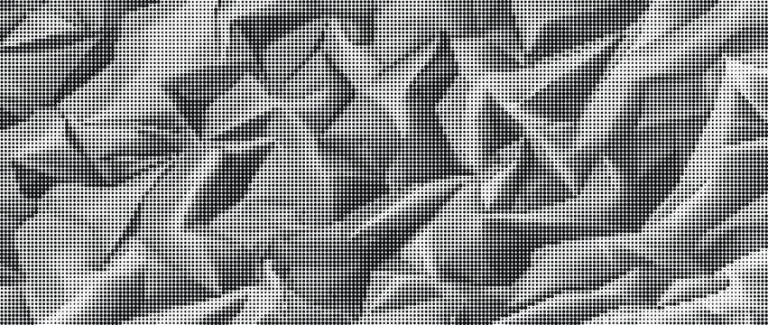A crumpled silver foil surface with many sharp folds and creases