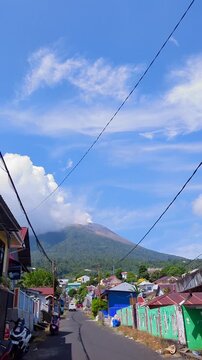 a view of gamalama mountain from the village