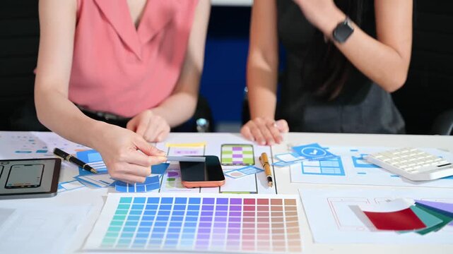 Ui graphic designer planning application process development prototype wireframe for web smart phone. Creative digital development agency.