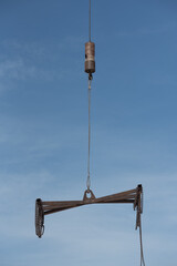Obraz premium Crane loader for lifting bundles of precast concrete slabs. 