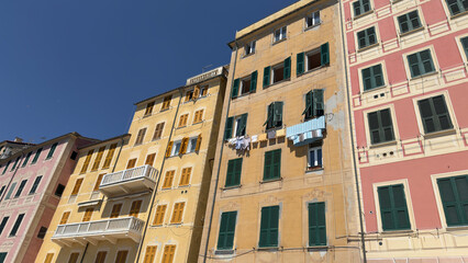 Fototapeta premium Colorful Traditional Italian Buildings with Hanging Laundry in Camogli
