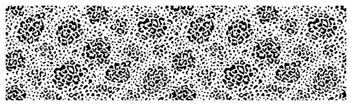 Spotted animal print pattern with abstract leopard dots and speckled texture background