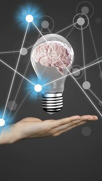 Vertical video: Lines entering left starting hand holding bulb with brain, showing network activity