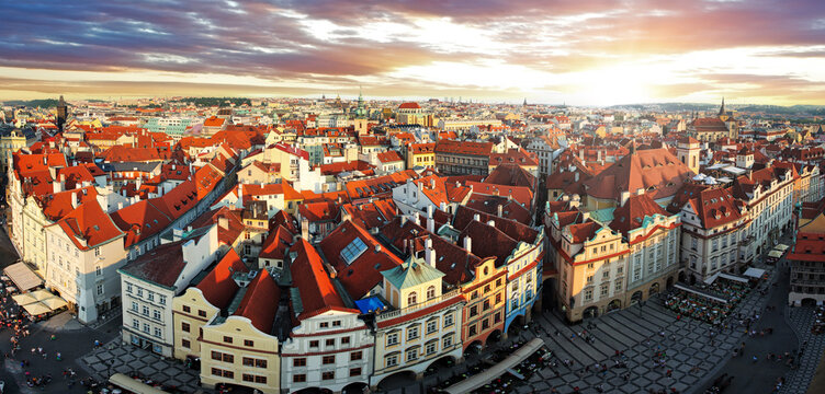 Aerial Prague panoramic view of skyline city of Prague at the Old Town Square, Czechia. From Holesovice with Vltava river, bridge at sunrise.