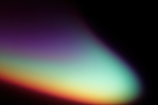 Abstract soft gradient background with vibrant complementary colors blending on a dark backdrop.