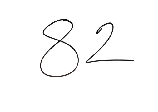 Number eighty two handwritten black digit on paper