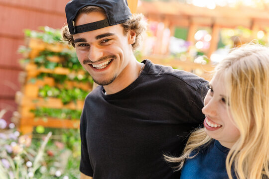 Happy young couple enjoying time outdoors