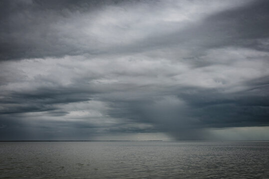 Storm clouds with rain over the ocean, Everglades National Park.