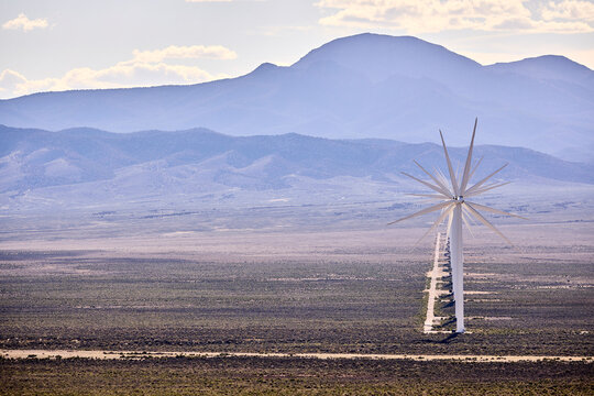 Star shaped wind turbines in a desert valley