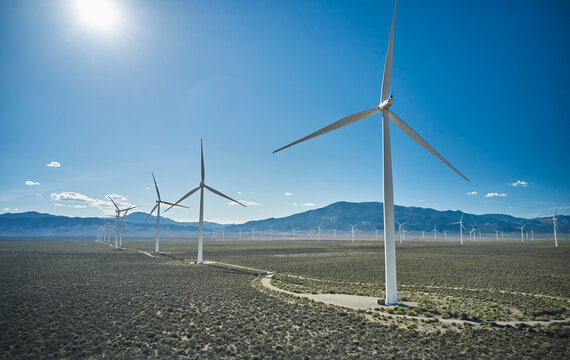 Wind turbines generate clean energy in sunny desert