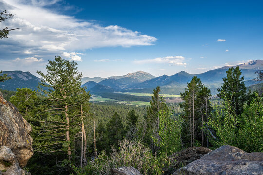 Scenic Rocky Mountain Landscape with Evergreen Hillside in Rocky