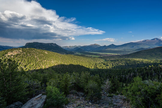 Scenic Rocky Mountain Landscape with Evergreen Hillside in Rocky
