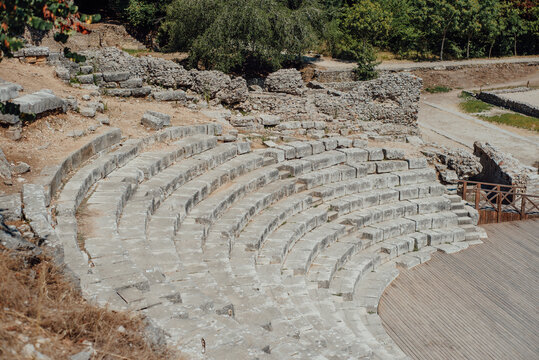 Stone seating of ancient theater in Butrint archaeological site