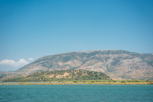 View across Lake Butrint with mountain scenery in Albania