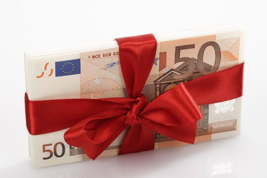 Bunch of banknotes tied as gift