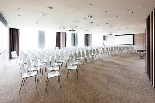 Poland, Warsaw, chairs at conference room of a hotel