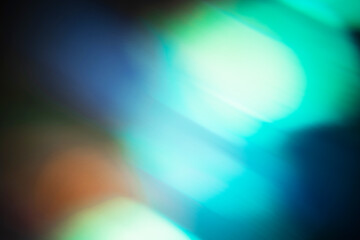 Obraz premium Green abstract background with light bokeh effect