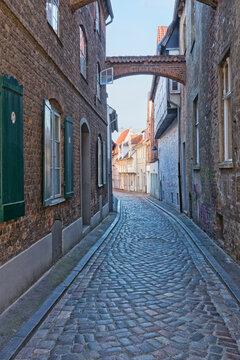 Small cobbled alley at the old town of L&uuml;beck, Germany