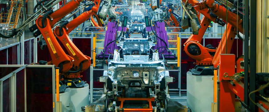 robotic arms on automated car production lines