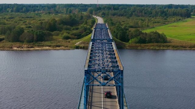 Aerial infrastructure scenery reveals steel bridge near Tīreļi countryside