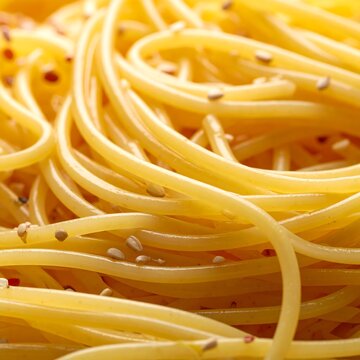 Delicious Spaghetti with Seasoning Closeup.