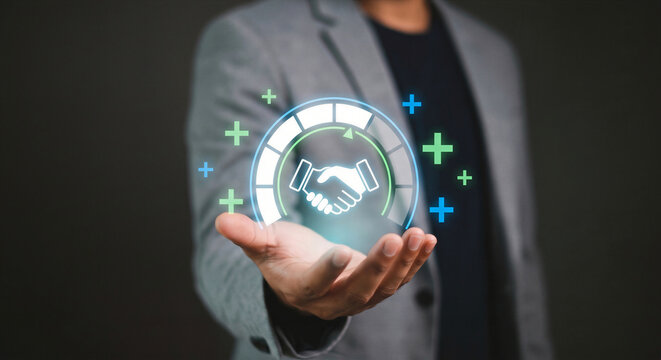 Man holding glowing digital handshake icon with a rating meter and plus signs. Concept for business partnership, trust, and added value