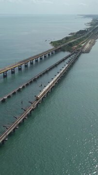 Vertical Aerial View of Train Crossing Pamban Bridge Tamil Nadu India