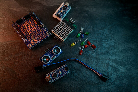 Electronics components, Breadboard in box with jumper wires and breadboard, symbolizing DIY projects, circuit building, electronic prototyping, hobby technology, electrical engineering