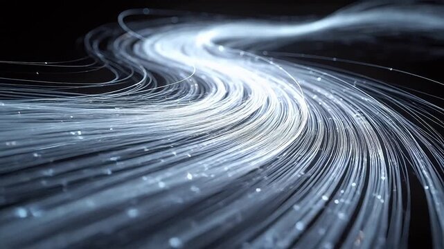 White light streaks spiraling in dark abstract space