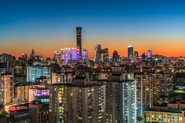 Fototapeta premium Night view of modern urban architecture in Beijing's Central Business District, China