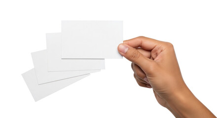 Fototapeta premium Hand holding blank white business cards with three additional cards stacked in the background, suitable for design or branding purposes