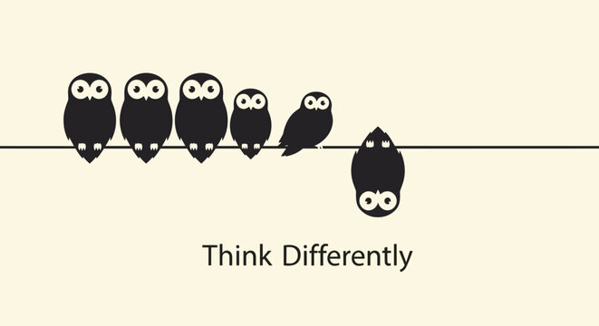 Unique leadership and creative thinking concept showing one upside down owl among a group sitting on a wire.